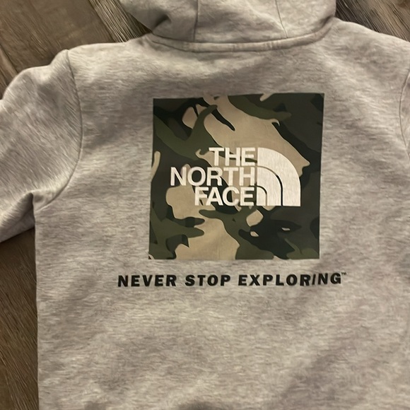 A grey kids never stop exploring sweatshirt. Size 10-12. - Picture 5 of 5
